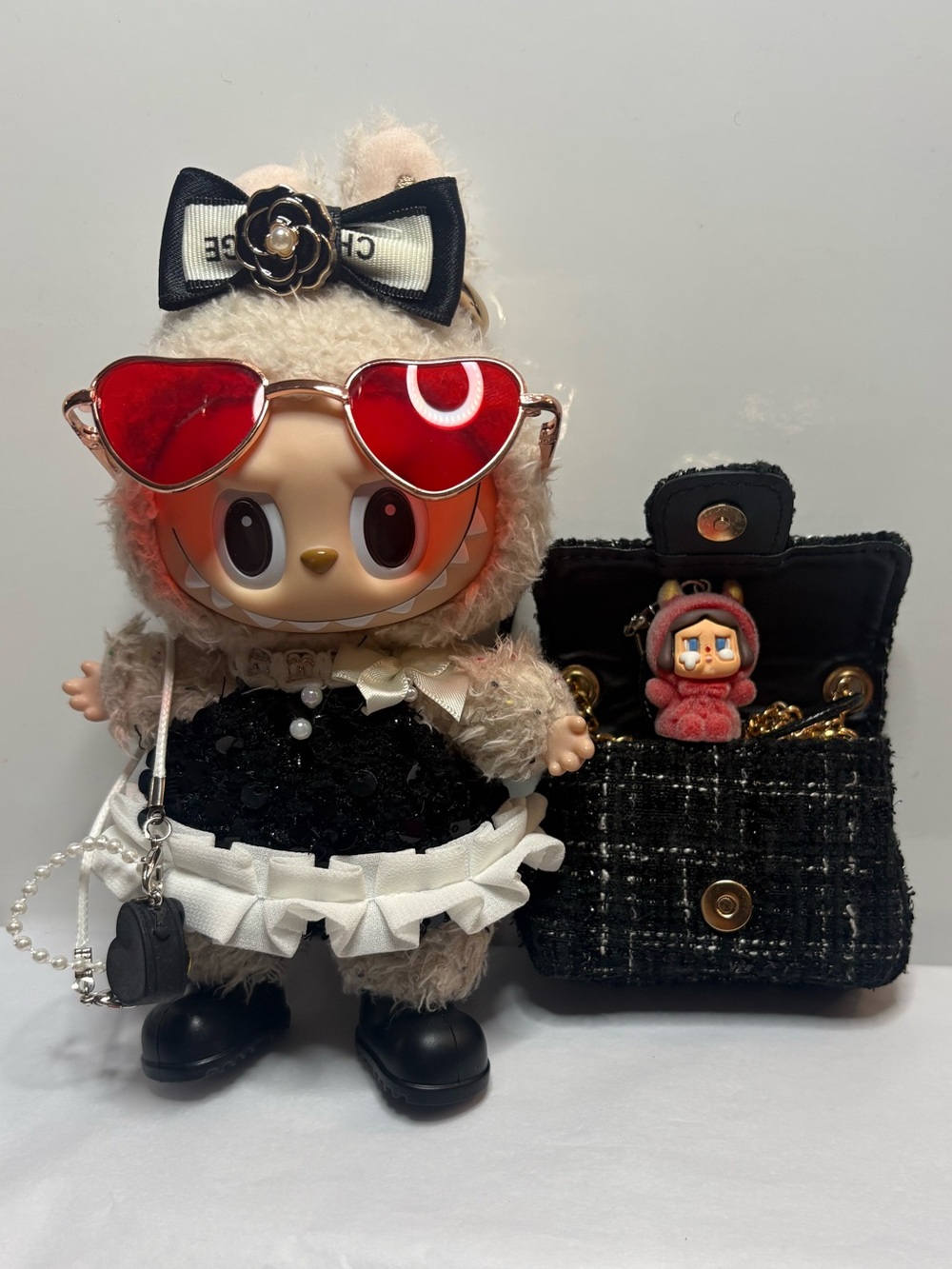 5 Piece Outfit + Matching AirPod Case for your Labubu! (Doll not included).